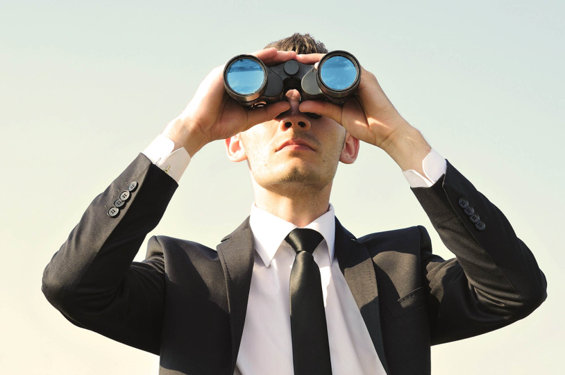 background, man with binoculars